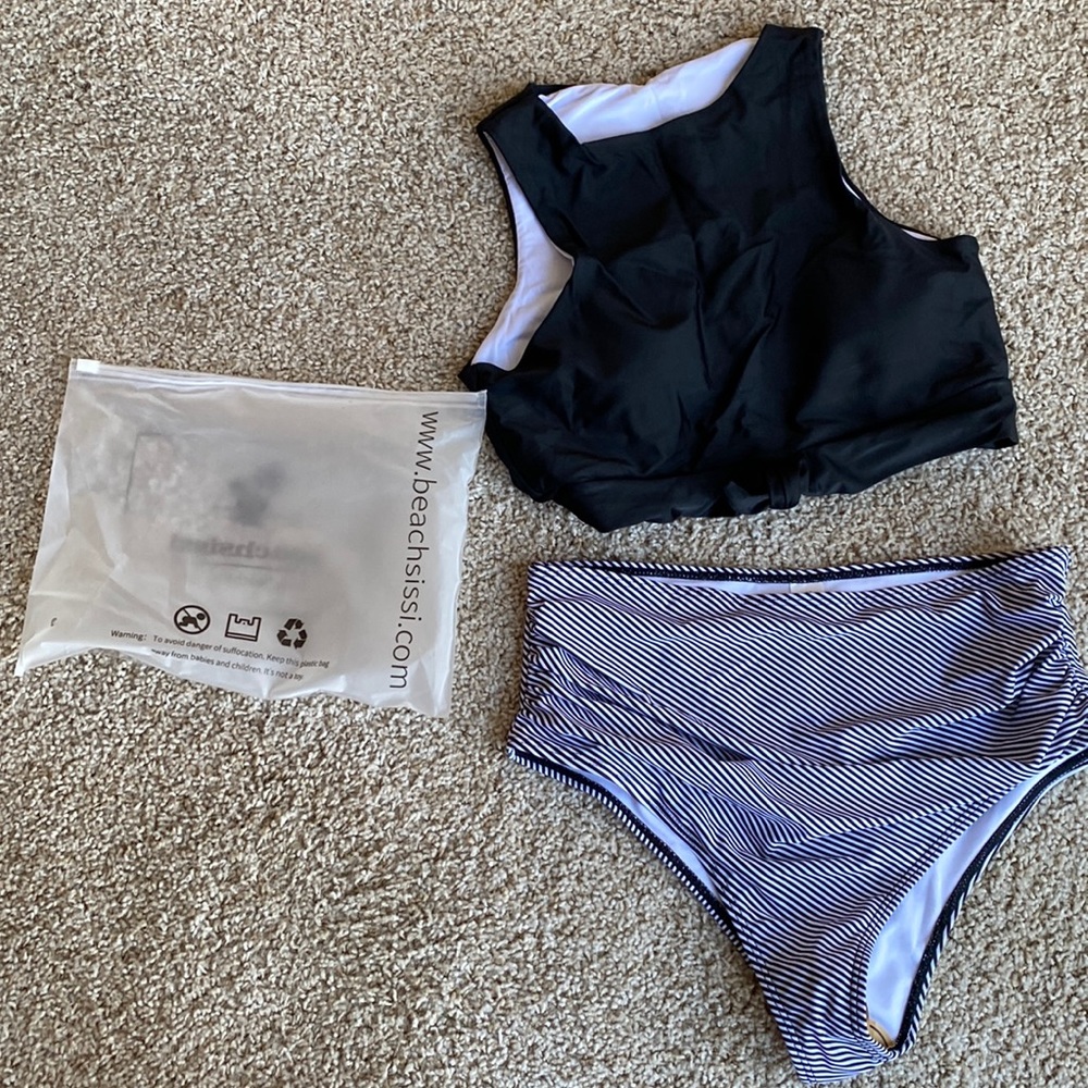 Women’s swimsuit size M. Never worn. BRAND NEW.